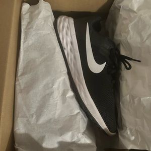 Nikes used twice, size 8, black and white with the original box